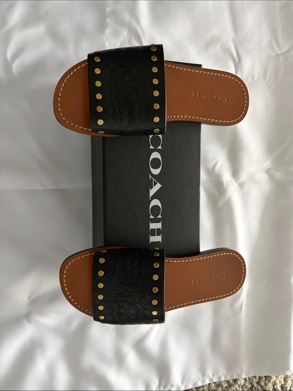Coach Black and Tan Woman’s Slide Sandals with Gold Studs